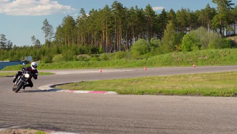 Cornering-a-roadster-motorbike-on-a-high-octane-race-circuit