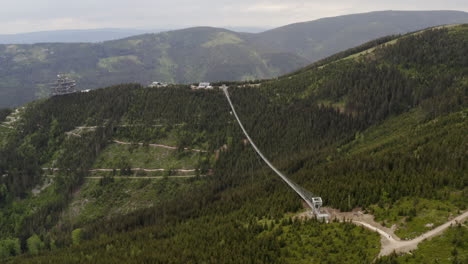 World's-longest-suspension-footbridge-in-mountains-of-Moravia,-drone