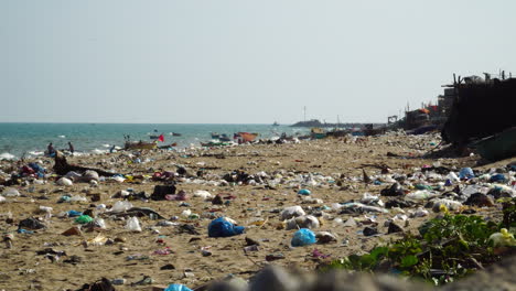 Plastic-Garbage-Scattered-On-The-Seashore-Of-Beach-In-Phan-Ri-Cua,-Vietnam