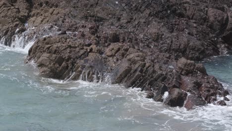 Ocean-waves-tumble-over-the-rocky-coastline-of-Cornwall-in-the-south-west-of-England