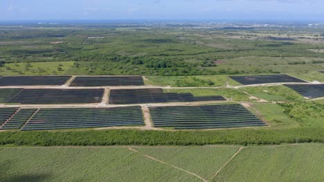 Aerial-drone-sideways-pov-of-El-Soco-solar-photovoltaic-park-of-San-Pedro-De-Macoris-in-Dominican-Republic