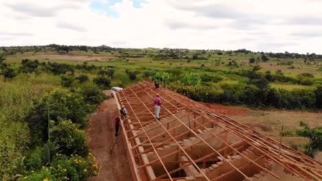 Building-Roof-of-the-Brick-House-in-Malawi,-Africa,-Drone-View