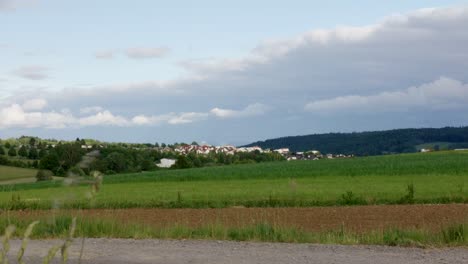 Timelapse-of-rural-village-on-hilly-landside-in-Stuttgart-in-afternoon,-Baden-Wurttemberg,-Germany,-Europe
