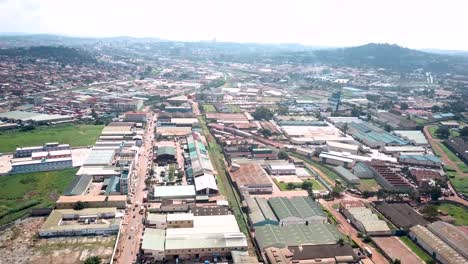 Drone-flyover-industrial-area-in-capital-of-Uganda,-Kampala-city