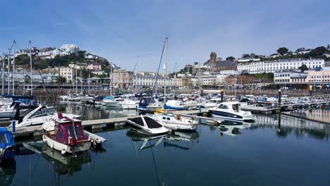 Panning-timelapse-of-the-inner-marina-and-harbor-in-Torquay-on-a-Sunny-day-with-boats-and-yachts