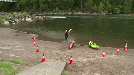 LIFE-GUARD-RUNNING-INTO-THE-RIVER-TO-SAVE-A-LIFE