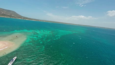 Turquoise-Sea-And-Vegetation-In-Isla-Cabra,-Monte-Cristi,-Dominican-Republic---aerial-FPV