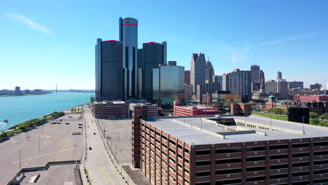 Slow-Rising-Aerial-View-of-the-Renaissance-Center,-a-Part-of-the-Detroit,-Michigan-City-Skyline-on-a-Sunny-Day