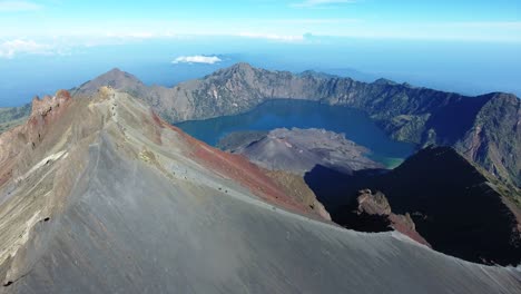 Aerial-Still-Shot-of-Climbers-at-Rinjani-Mountain-Summit-at-Sunrise-in-Lombok-Indonesia