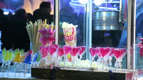 Colorful-sweets,-pop-corn,-candies-and-lollipops-at-Christmas-fair