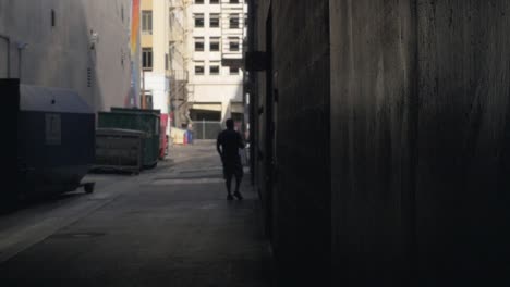 Walking-slowly-in-a-dark-alley-in-the-city