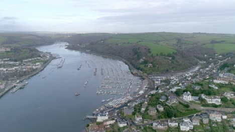 Aerial-tracking-across-Dartmouth-Harbour-and-the-Marina-on-the-east-side-of-the-estuary-which-is-part-of-Kingswear