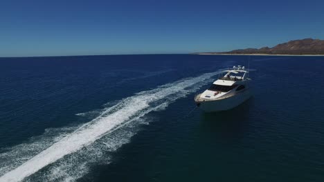 Aerial-drone-shot-of-a-jet-ski-and-a-yacht-in-in-Cabo-Pulmo-National-Park,-Baja-California-Sur