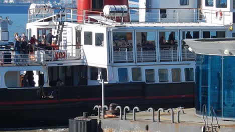 Liverpool-Mersey-ferry-close-up-with-passengers-slowly-coming-into-port
