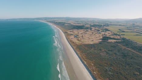 Overhead-Aerial-Drone-Wide-Shot-of-the-Beautiful-Blue-Ocean-and-Coastline-of-New-Zealand