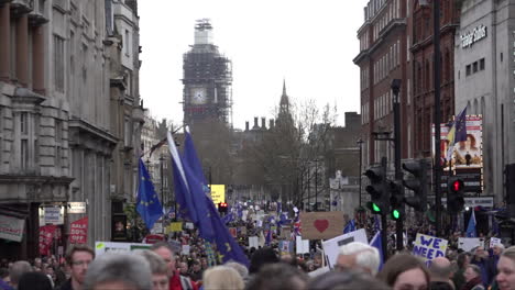 Thousands-of-anti-Brexit-protestors-march-down-Whitehall-towards-Parliament-carrying-placards-and-European-Union-flags