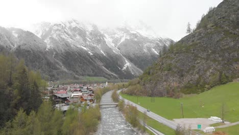 aerial-footage-of-a-small-river-in-the-austrian-alps---Sölden,-Austria---drone
