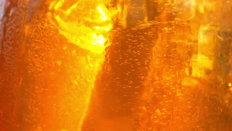 Refreshing-orange-drink-in-the-sun---180fps