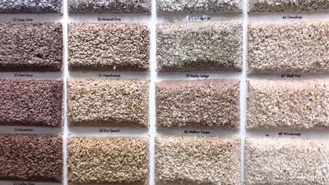 Colorful-square-carpet-samples-in-the-store-made-for-the-interior-residential-and-commercial-decoration