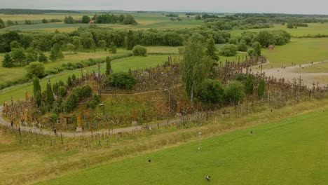 Aerial-view-of-Hill-of-Crosses,-the-cult-place-for-catholics-in-Lithuania