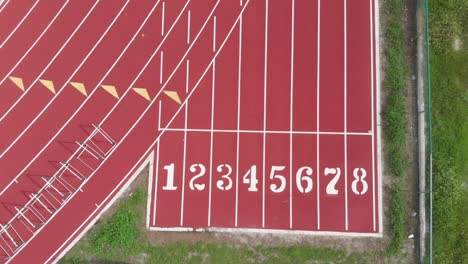 Aerial-view-of-high-school-track-field,-the-starting-line-for-sprinters