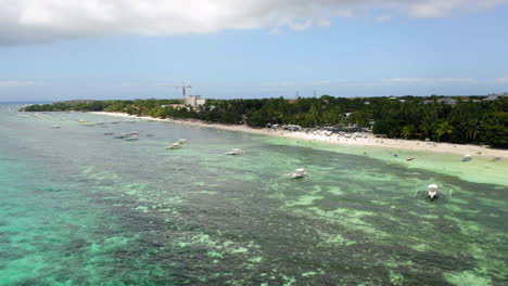 Aerial-shot-of-the-Alona-beach,-Bohol,-Philippines