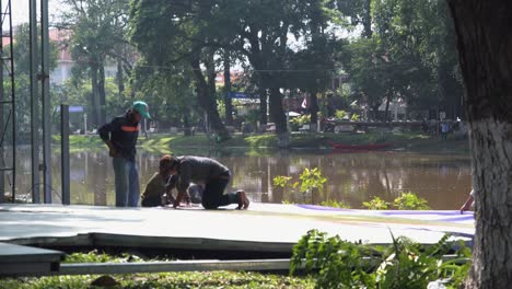 Setting-Up-by-the-River-for-Water-Festival