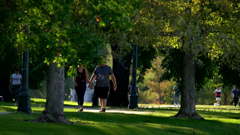People-walking-in-the-City-Park-of-Denver,-Colorado