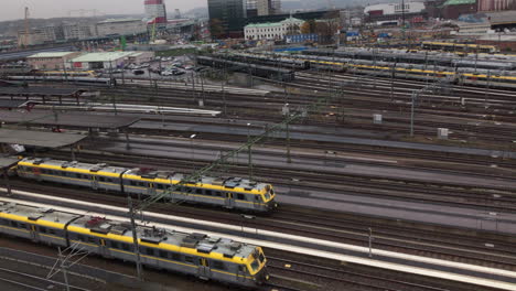 15th-Oct-2019,-Gothenburg,-Sweden:-a-train-leaving-the-central-station-of-Gothenburg-in-a-grey-winter-day,-Sweden