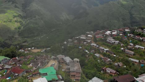 4k-Aerial-Spiral-shot-of-one-of-the-largest-village-Tuensang-of-Nagaland,-India