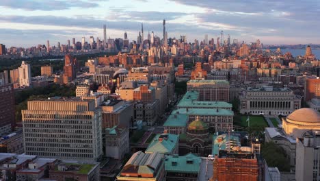 Aerial-view-over-the-Morningside-Heights-neighborhood-of-Manhattan,-NYC-at-golden-hour-sunrise