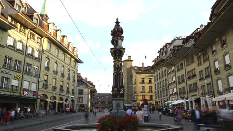 Bern-Switzerland,-circa-:-Timelapse-People-on-the-shopping-alley-with-clock-tower-of-Bern-in-Switzerland