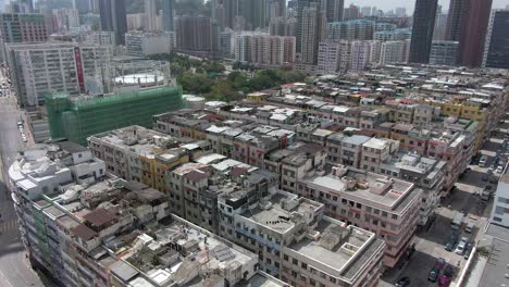 Ciudad-Amurallada-De-Kowloon-De-Hong-Kong,-Un-Barrio-Marginal-Densamente-Poblado,-Vista-Aérea