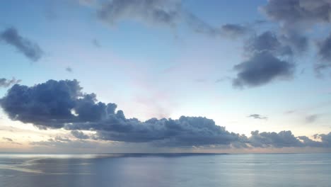 Panoramic-View-Of-Beautiful-Sunset-With-Reflection-On-The-Water-In-Fiji-Island--aerial-shot