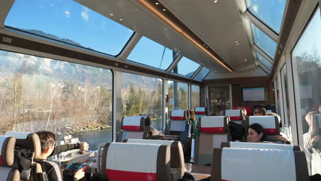 Wide-angle-view-of-first-class-passenger-cabin-of-the-Glacier-Express-train-in-Switzerland