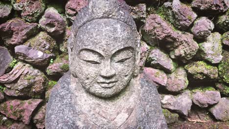 Oriental-style-garden-buddah-statue-made-of-rock-or-stone