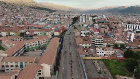 4k-daytime-aerial-drone-footage-over-Avenida-de-la-Cultura-boulevard-in-Cusco,-Peru-during-Coronavirus-lockdown