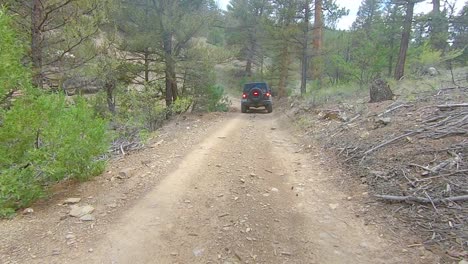POV-Following-a-Jeep-On-a-Narrow-Off-Road-Mountain-Trail-in-the-Rocky-Mountains-of-Colorado