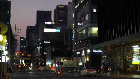 Small-Korean-street-in-Gangnam-district-at-night-on-sunset,-Seoul-South-Korea