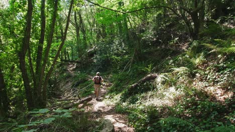 Hiking-along-rocky-footpaths-near-the-River-Riells,-Catalonia-Spain