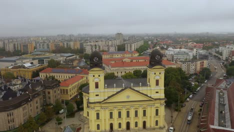 Drone-footage-from-the-Church-at-Debrecen-citys-main-squarein-rainy-weather-autumn-Drone-flies-forwards-and-over-the-church
