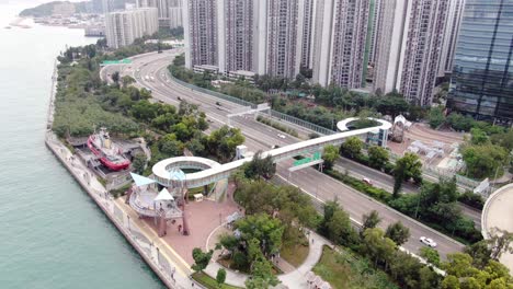 Hong-Kong-quarry-bay-park-with-waterfront-decommissioned-Fireboat-museum-and-exhibition-gallery-named-after-Alexander-Grantham,-Aerial-view