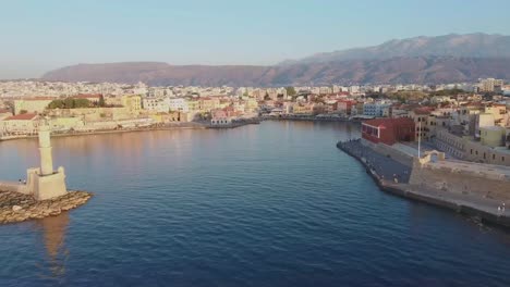 Aerial-drone-view-video-of-iconic-and-picturesque-Venetian-old-port-of-Chania-with-famous-lighthouse-and-traditional-character