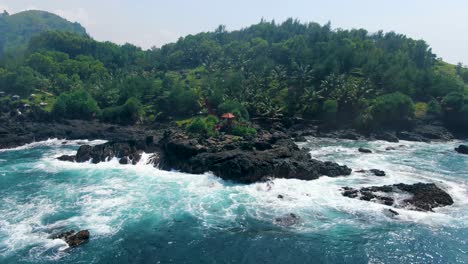 Scenic-aerial-panorama-of-Menganti-coast-with-viewpoint-on-rock,-Java,-Indonesia
