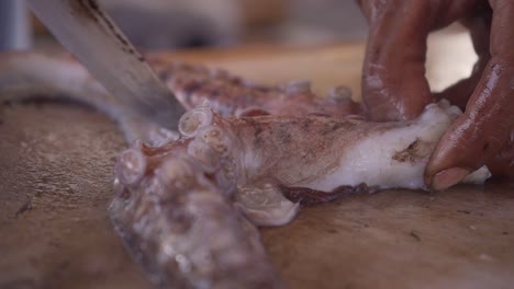 cooking-and-cutting-an-octopus.-close-up-shot