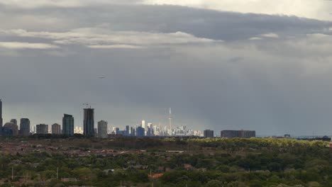 Shifting-clouds-letting-the-sun-cast-beautiful-rays-over-Mississauga-and-Toronto-Skyline