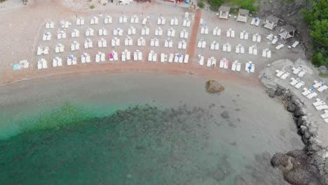 Birds-eye-view-aerial-drone-footage-of-empty-beach-on-adriatic-sea-in-montenegro