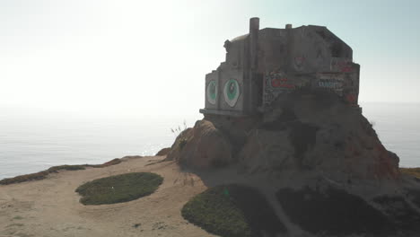 Rotating-Aerial-Pull-Away-From-WWII-Devil’s-Slide-Bunker-on-California-Coast-Highway-One