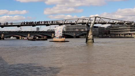 London's-Millennium-bridge-crossing-the-river-Thames