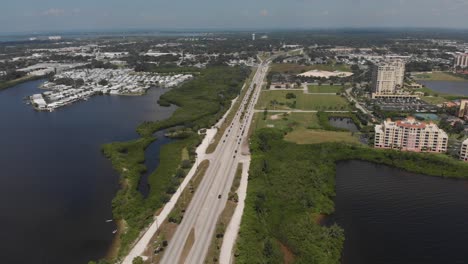 Aerial-of-Route-41-heading-into-Palmetto,-Florida